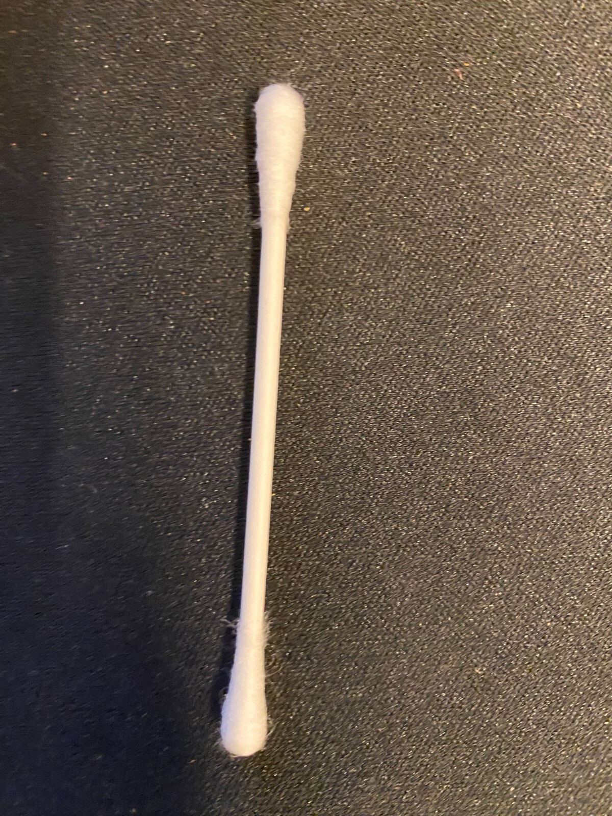 white plastic Q-tip