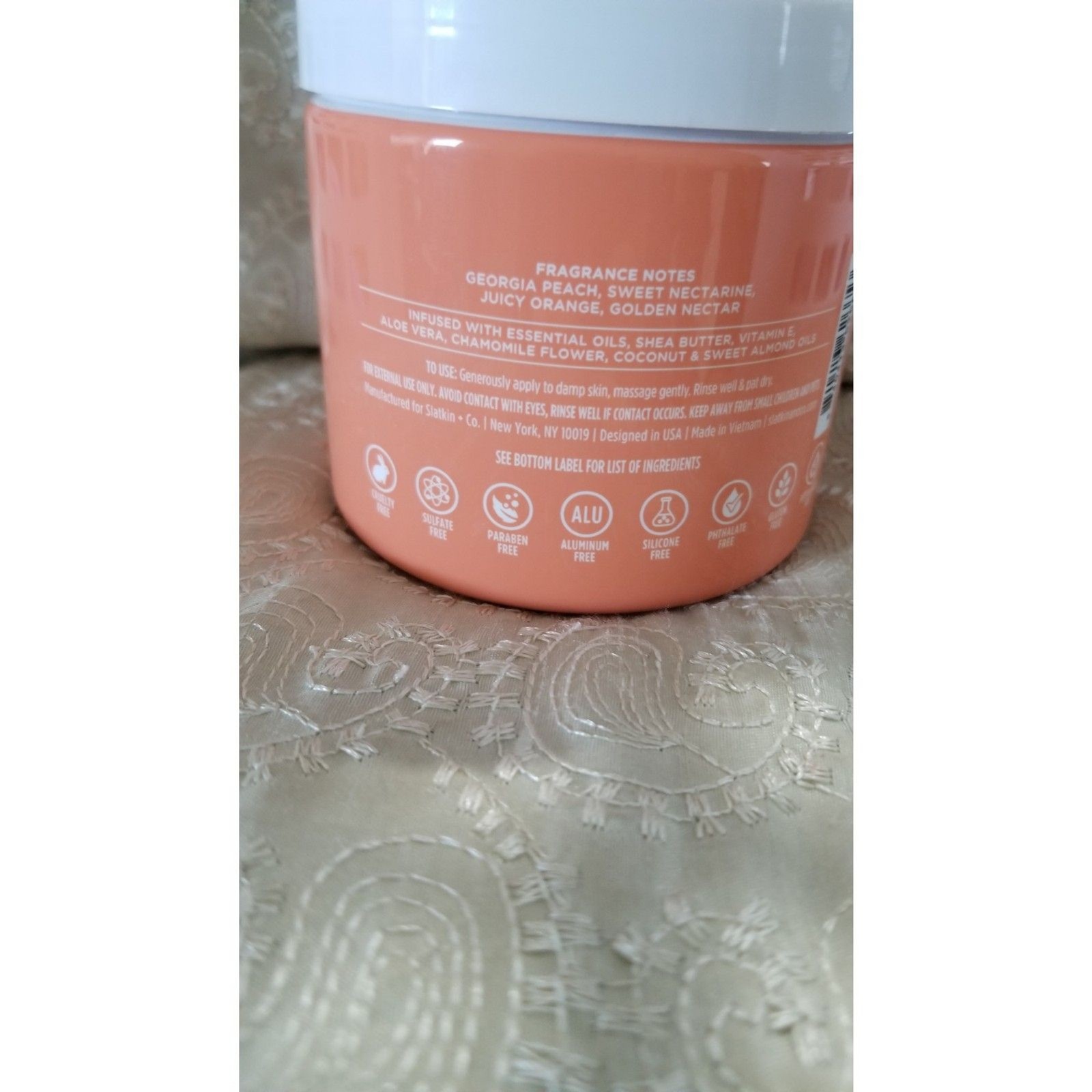 The Homeworx Fresh Georgia Peach Body Scrub by Slatkin + Co. is a, 18.5-oz