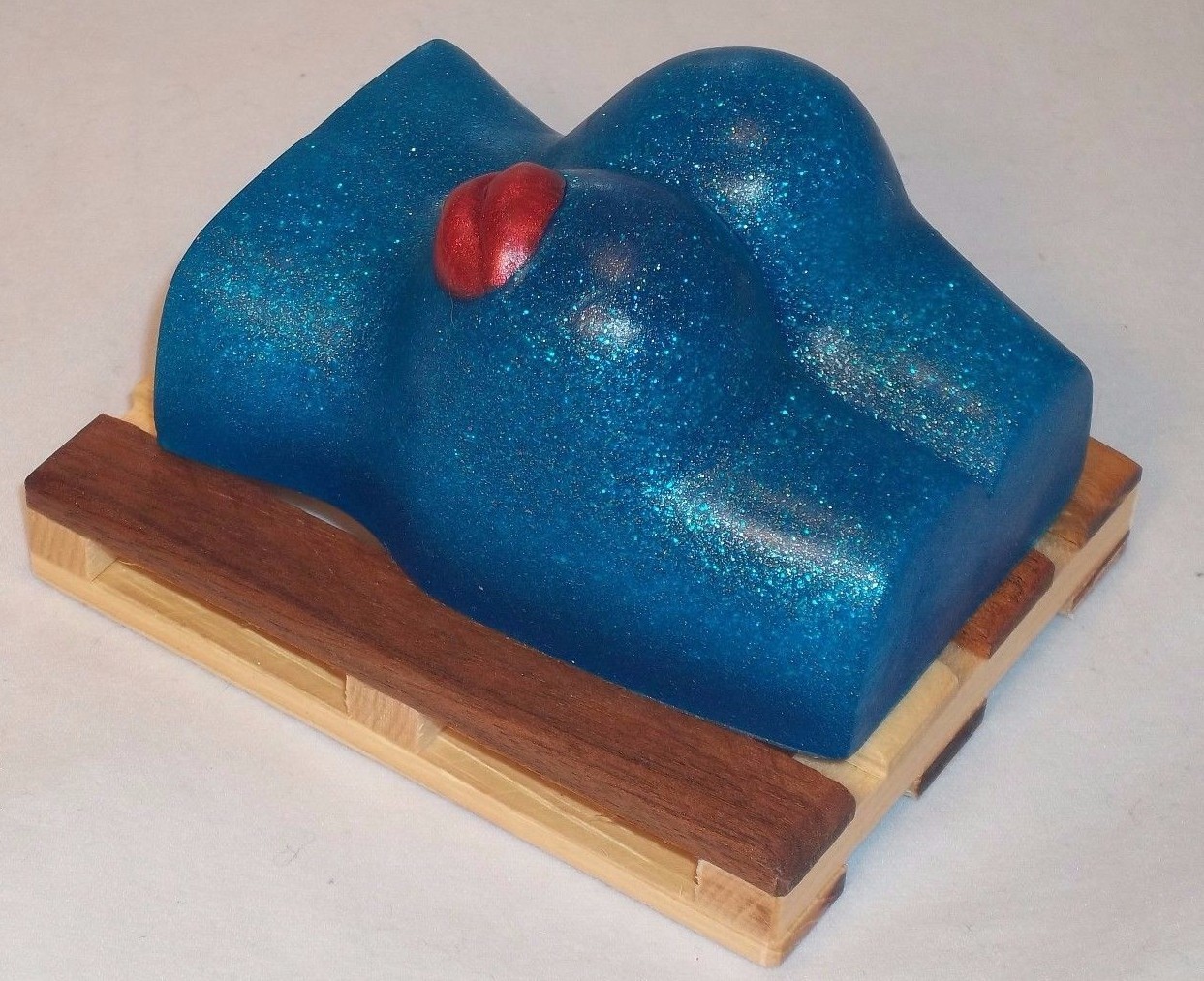 Beach Bum, our bathing booty in rich blue in the scent of Davidoff’s “Cool Water