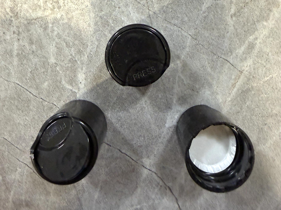 A 20/410 Smooth PP Black Disc Press Caps 20/410 with PS liner – 25 qty